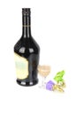 Liqueur black bottle with two sweets.