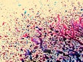 Liquid blots and splashes of colored paint on a light surface, isolated. Abstract colorful pattern of blue, red and purple lines, Royalty Free Stock Photo