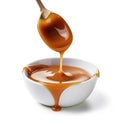 Liquid caramel topping on white backgrounds