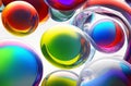 Liquid Colors in a Transparent Orb and Bubbling Glass Spinning in Rolled Colors Background.