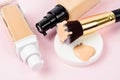 Liquid foundation makeup with brush and sponge Royalty Free Stock Photo