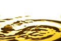 Liquid gold drop and ripple Royalty Free Stock Photo