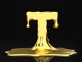 Liquid gold letter T