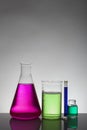 Liquid in laboratory bottles. Scientific biochemical laboratory. Colorful liquid