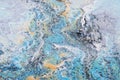 Liquid marble, fluid art, blue and gray ink background with paint spots. Swirl pattern, stained texture. Modern painting, creative Royalty Free Stock Photo