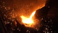 Liquid metal from blast furnace. Liquid iron from ladle in the steelworks Royalty Free Stock Photo