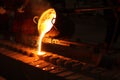 Liquid metal from casting ladle Ferrous metallurgy Royalty Free Stock Photo