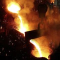 Liquid metal in the foundry, melting iron in furnace, steel mill