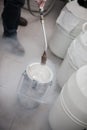 Liquid nitrogen technician fills container Royalty Free Stock Photo