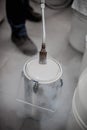 Liquid nitrogen technician fills container Royalty Free Stock Photo