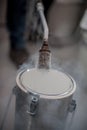 Liquid nitrogen technician fills container Royalty Free Stock Photo