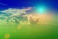 Cloudy blue sky on a sunny day. The Sun and the Sun`s rays against the blue sky and clouds. Royalty Free Stock Photo