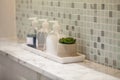 Liquid soap bottle with tile background Bathroom accessories.