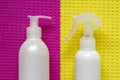 Liquid soap dispenser and spray disinfectant protection and prevention from bacteria and viruses on a yellow-pink surface