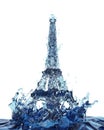 Liquid splash of fresh blue water in eiffel tower paris form, isolated on white background. Royalty Free Stock Photo