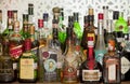 Liquor bottles on a bar Royalty Free Stock Photo