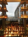 Liquor bottles on shelves lit from beneath at the airport bar at JFK Airport in NYC.