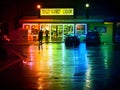 Liquor Store on a Wet Rainy Night Royalty Free Stock Photo