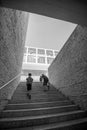 Two boys walking up stairs at Centro Cultural de Belem..