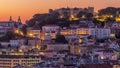 Lisbon aerial cityscape skyline night to day timelapse from viewpoint of St. Peter of Alcantara, Portugal Royalty Free Stock Photo