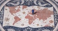 Lisbon - Aerial view of tourist man standing on the giant mosaic of a world map and compass at the discoveries monument, Lisbon Royalty Free Stock Photo