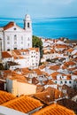 Lisbon, Alfama district with orange roof tiles and white walls, Portugal