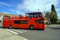 The Lisbon sightseeing bus tour in Lisbon, Portugal. The Lisbon bus tour is popular service for tourists . Royalty Free Stock Photo