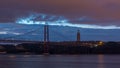 Lisbon city before sunrise with April 25 bridge night to day Royalty Free Stock Photo