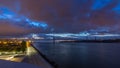 Lisbon city before sunrise with April 25 bridge night to day Royalty Free Stock Photo