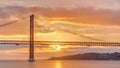 Lisbon city sunrise with April 25 bridge night to day Royalty Free Stock Photo