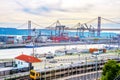 Lisbon commercial port, city bridge Royalty Free Stock Photo