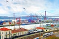 Lisbon commercial port, containers, bridge Royalty Free Stock Photo