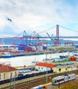 Lisbon commercial port, containers, bridge Royalty Free Stock Photo