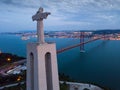 Lisbon and 25 de Abril Bridge early in morning