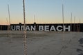 Lisbon harbour, Portugal. Urban beach at sunset