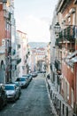 Lisbon, may 1, 2018: an Ordinary city street with residential buildings. Normal life in Europe. Car parking Royalty Free Stock Photo