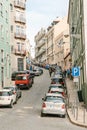 Lisbon, may 1, 2018: an Ordinary city street with residential buildings. Normal life in Europe. Car parking Royalty Free Stock Photo