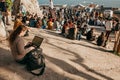 Lisbon, 01 May 2018: A young girl student or blogger or freelancer works on the computer or communicates on the Internet