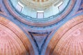 Lisbon National Pantheon. Image of dome and vaulted arched ceiling with colored lighting, church of santa engracia. Royalty Free Stock Photo