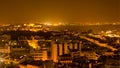 Lisbon by night: the castle, the Tagus river and downtown Royalty Free Stock Photo