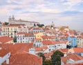 Lisbon panoramic view. Colorful walls of the buildings of Lisbon, with orange roofs and the Church of Sao Vicente of Fora in the