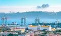 Lisbon port, cranes cargo containers Royalty Free Stock Photo