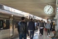 People leaving train station in the late afternoon Royalty Free Stock Photo