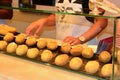 Lisbon, Portugal - August 05, 2017: Row of portuguese pastel bacalhau in Casa Portuguesa do pastel bacalhau