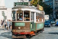 Tourists Travel By Tram 28 In Downtown Lisbon City