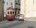 Tourists visit the Lisbon with the red tram and tuk-tuk Royalty Free Stock Photo