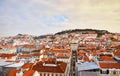 Lisbon Portugal - Beautiful panoramic view of the red roofs of houses in antique historical district Alfama and the Tagus River
