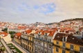 Lisbon Portugal - Beautiful panoramic view of the red roofs of houses in antique historical district Alfama and the Tagus River Royalty Free Stock Photo