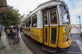 Typical vintage yellow tram in Lisbon, Portugal