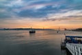 Beautiful view on sunset over River Tagus and 25 de Abril bridge (25th of April Bridge